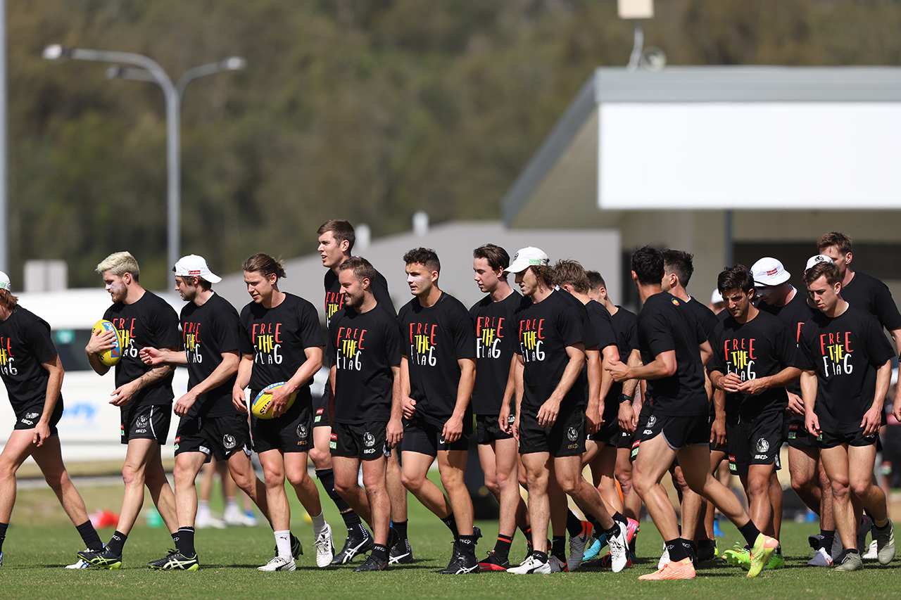 The players wear Free the Flag t-shirts